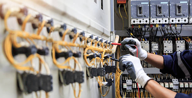 Professional Electrician technician working in West Branch, IA